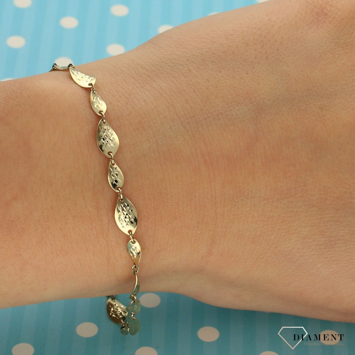 Złota bransoletka 333 'płaskie, grawerowane ogniwka' BR 5139 (1).jpg